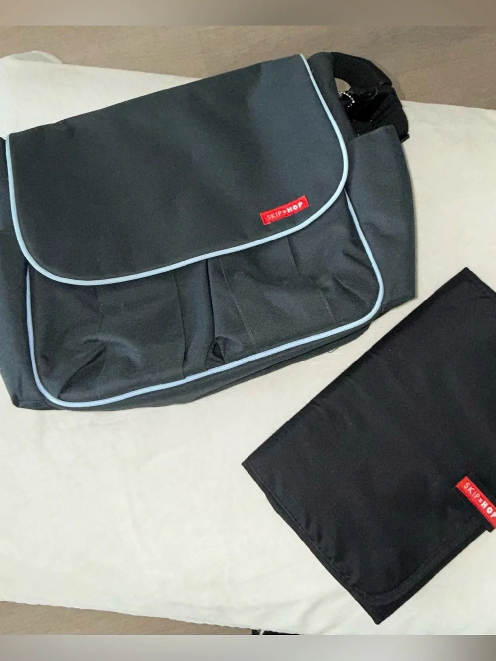 Skip Hop Black Messenger Bag with Light Blue Piping